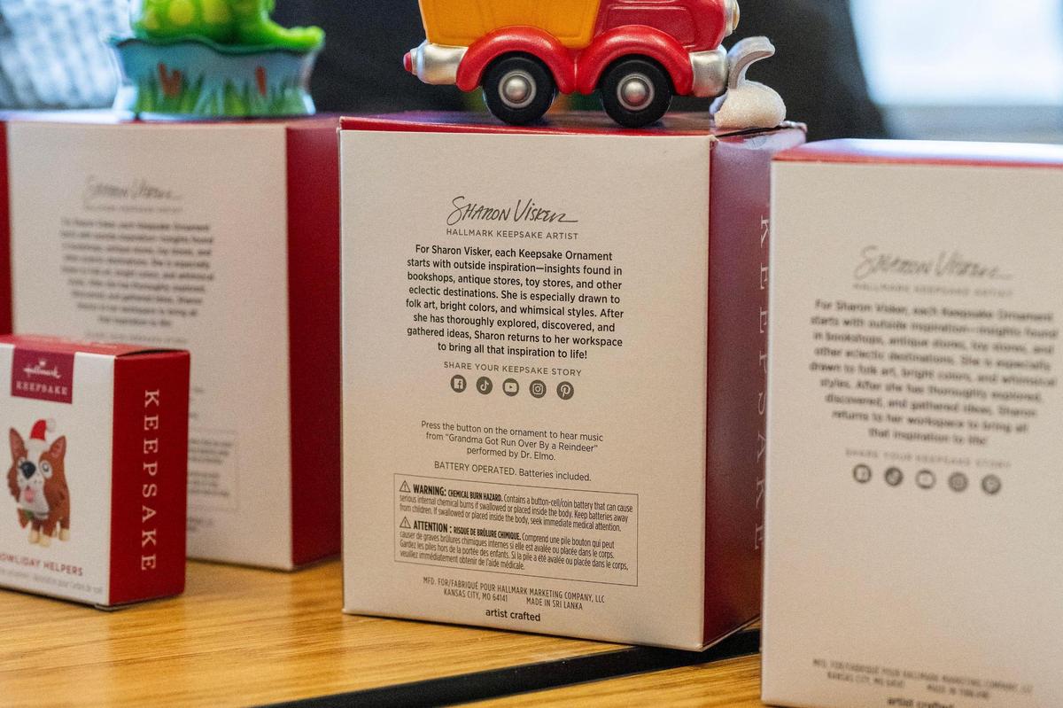 A short profile on Sharon Visker, the Hallmark artist behind several keepsake ornaments is shown on the back the boxes of the ornaments she’s designed.