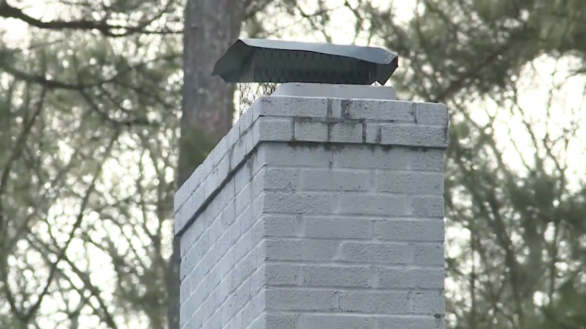 Elliot Stewart was arrested and charged with murder after getting stuck in a Forrest City chimney, police say.