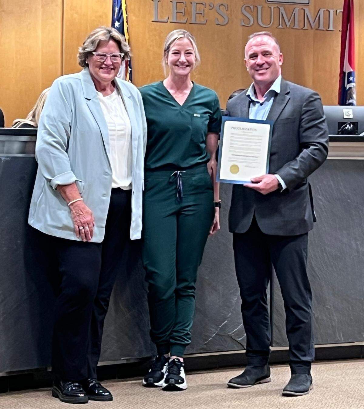 Nina Noe (left), Dr. Erin Brockhaus and Mayor Bill Baird at the Lee’s Summit Council meeting where Dr. Brockhaus was recognized.