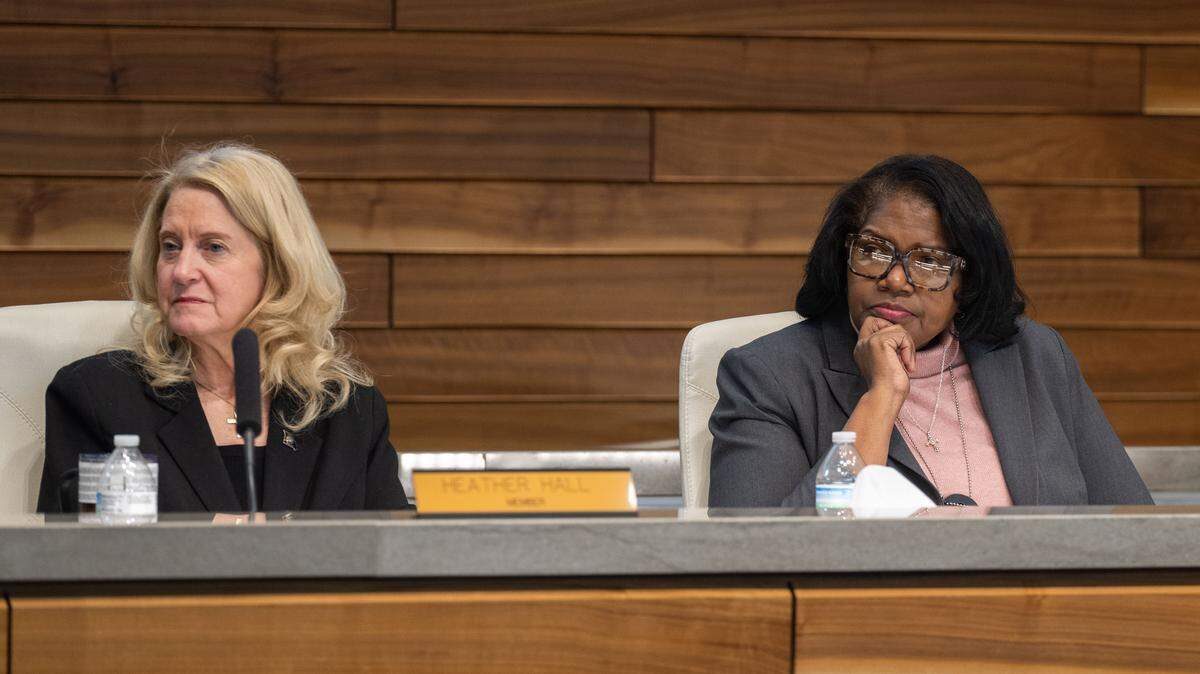 Board members Heather Hall and Madeline Romios listen to a member of KCPD during the Kansas City Board of Police Commissioners January meeting on Tuesday, January 27, 2026, at KCPD Headquarters.