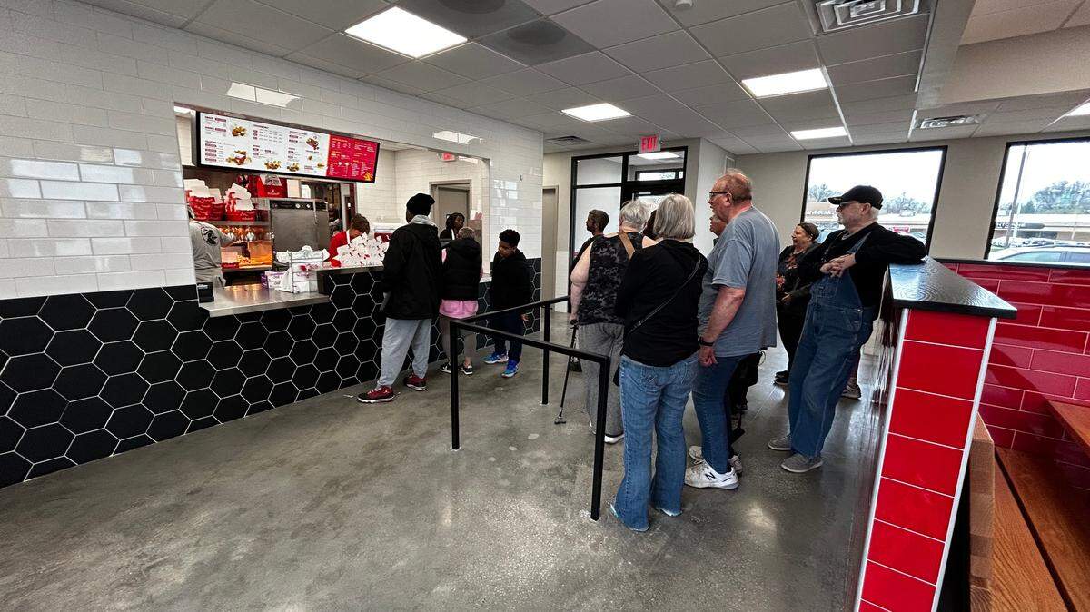 Customers lined up inside for the soft launch of Go Chicken Go’s Northland location.