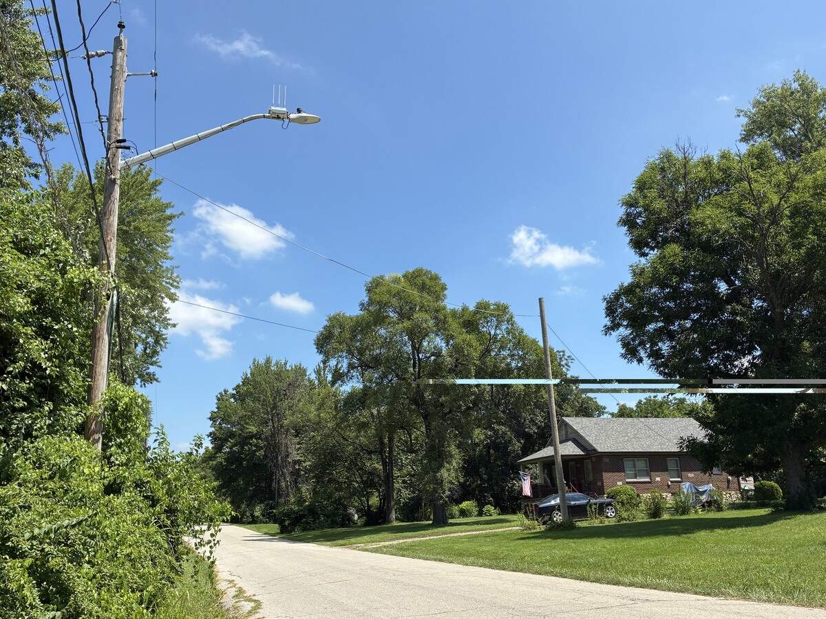 Utility pole (left) on North 74th Street in Kansas City, Kansas where Joshua McKee, a Kansas City Board of Public Utilities lineman was killed on Sunday evening.