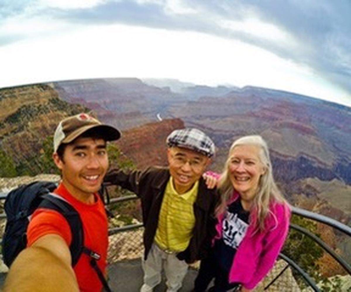 John Allen Chau of Vancouver, Wash., with his parents.