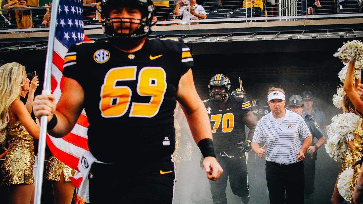 Missouri football coach Eli Drinkwitz runs on the field prior to the Tigers’ game against Louisiana Tech on Sept. 1, 2022.