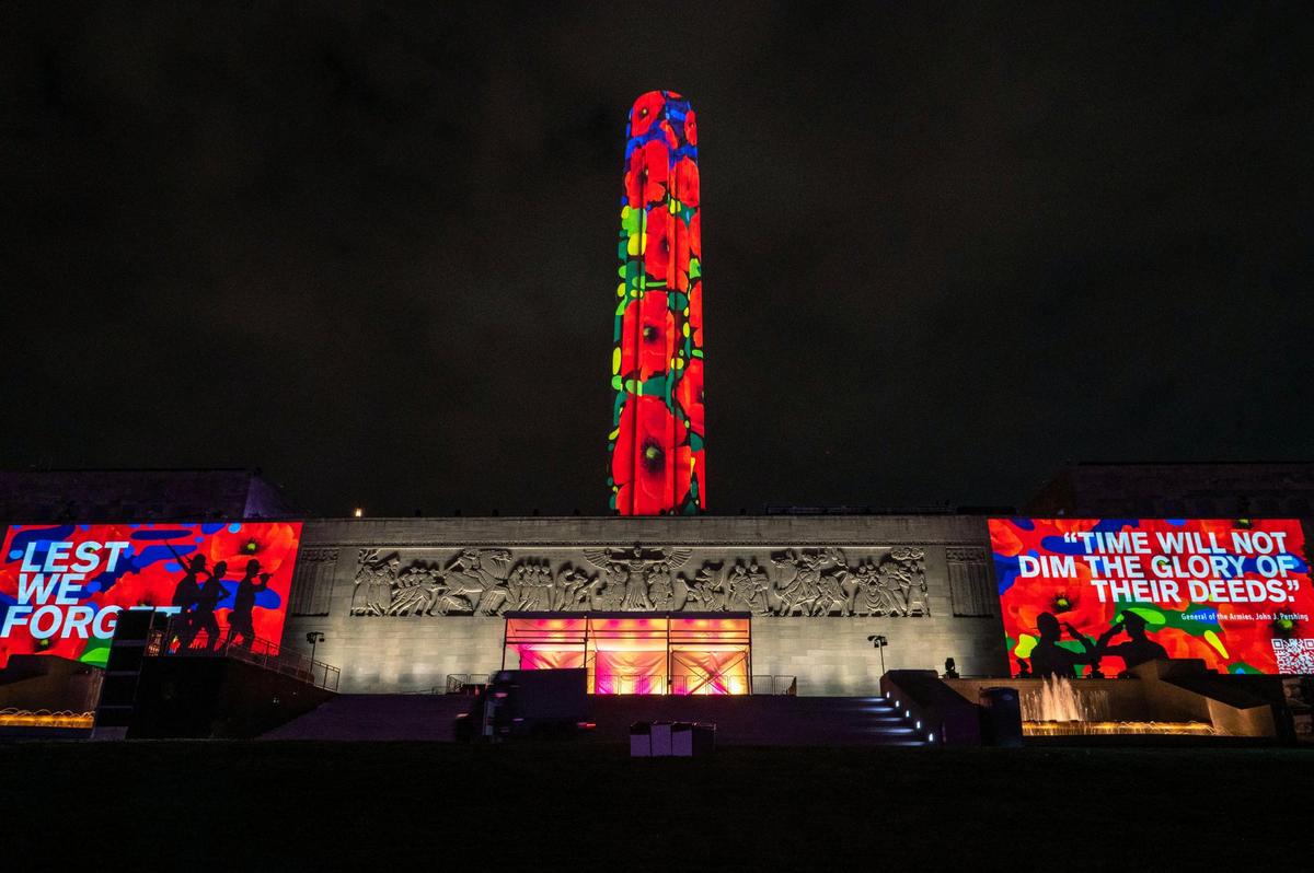 An art installation called “Horizons,” designed by artist Kathy Pittala is projected on Liberty Memorial Tower and the North Terrace at the National WWI Museum and Memorial on Tuesday, April 25, 2023, in Kansas City.