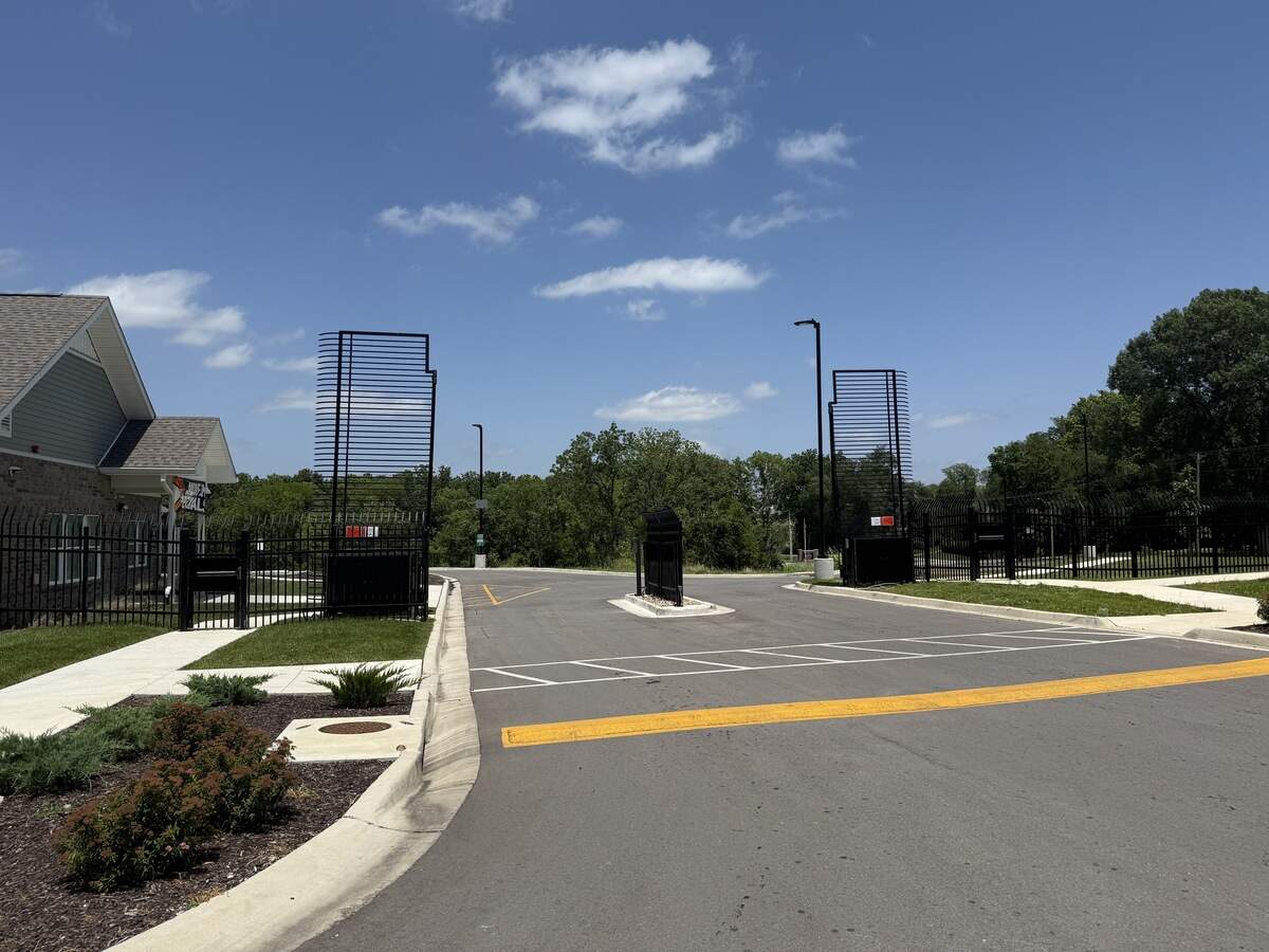 The gates to enter The Depot on Old Santa Fe apartments were up on Sunday, June 28 in Kansas City, Missouri. This was a day after a deadly shooting that left two teenagers dead.