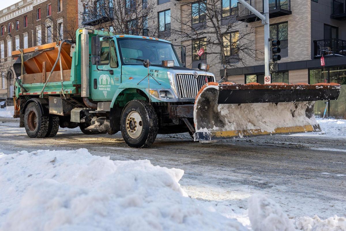 A Kansas City Parks and Recreation snowplow clears Armour Boulevard on Tuesday, Jan. 7, 2025, in Kansas City.