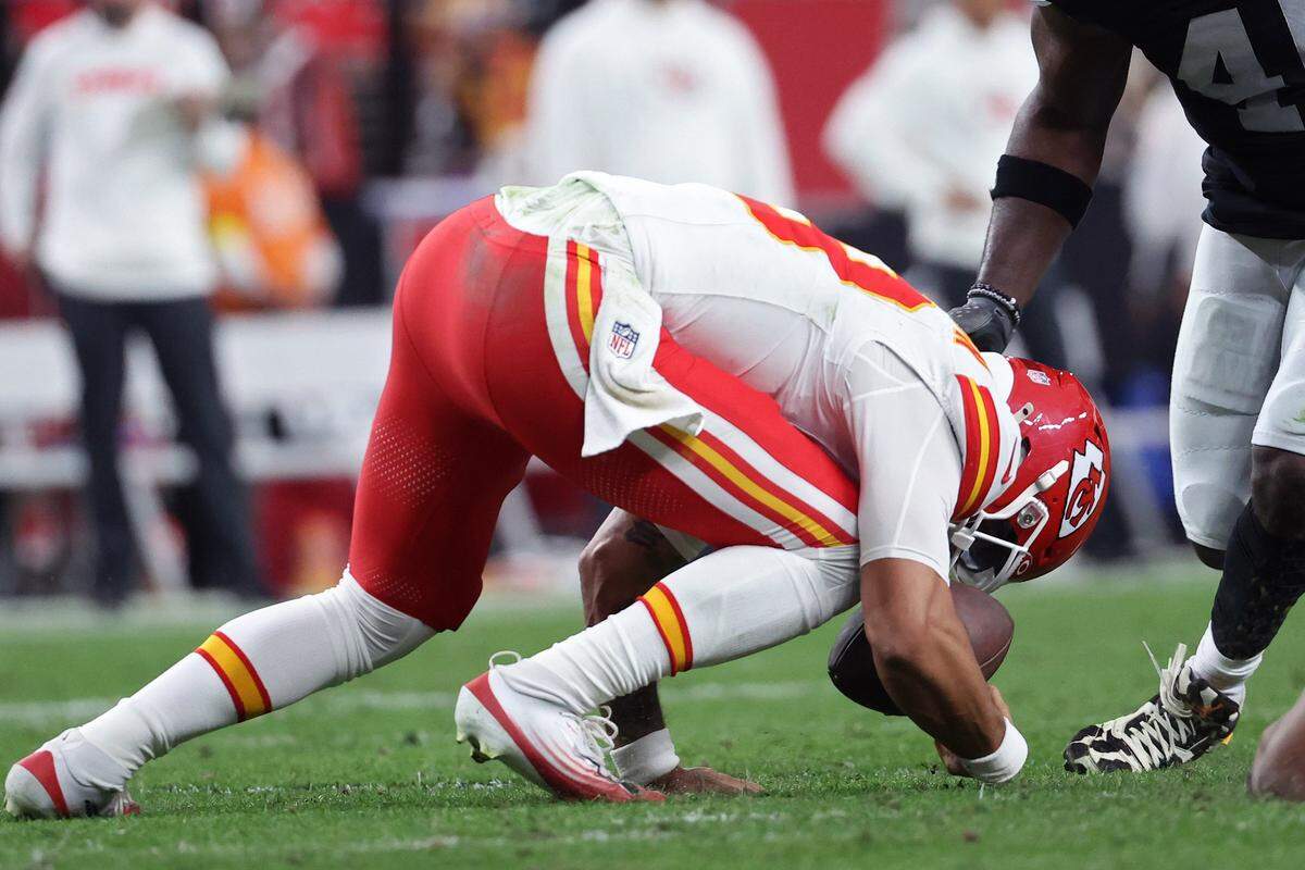Kansas City Chiefs quarterback Chris Oladokun loses a fumble against the Raiders during an NFL Week 18 game at Allegiant Stadum in Las Vegas on Sunday, Jan. 4, 2026.