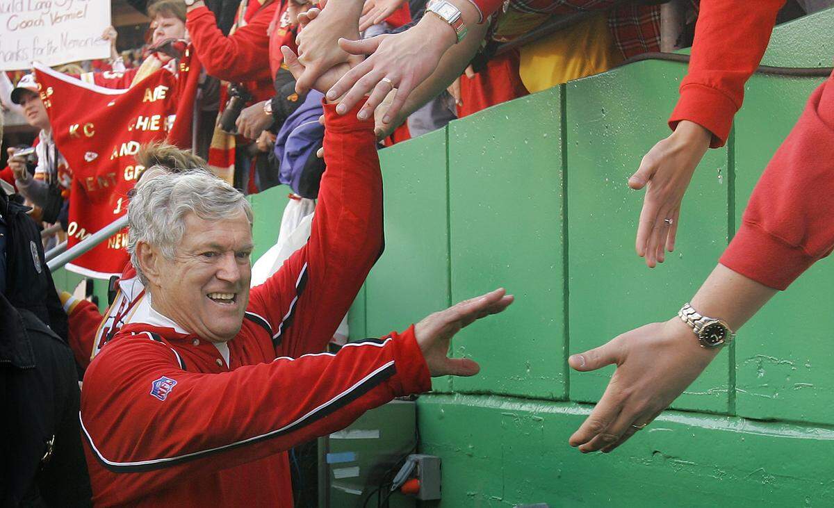 Kansas City Chiefs head coach Dick Vermeil accepts congratulations from Chiefs fans after the 37-3 victory over the Cincinnati Bengals on Jan. 1, 2006 at Arrowhead Stadium. Vermeil announced his retirement to the team the night before. Vermeil served as head coach of the Kansas City Chiefs from 2001 to 2005, leading the team to consistent playoff appearances. Under his leadership, the Chiefs won the AFC West title in 2003. Vermeil finished his tenure with a 44–36 record.