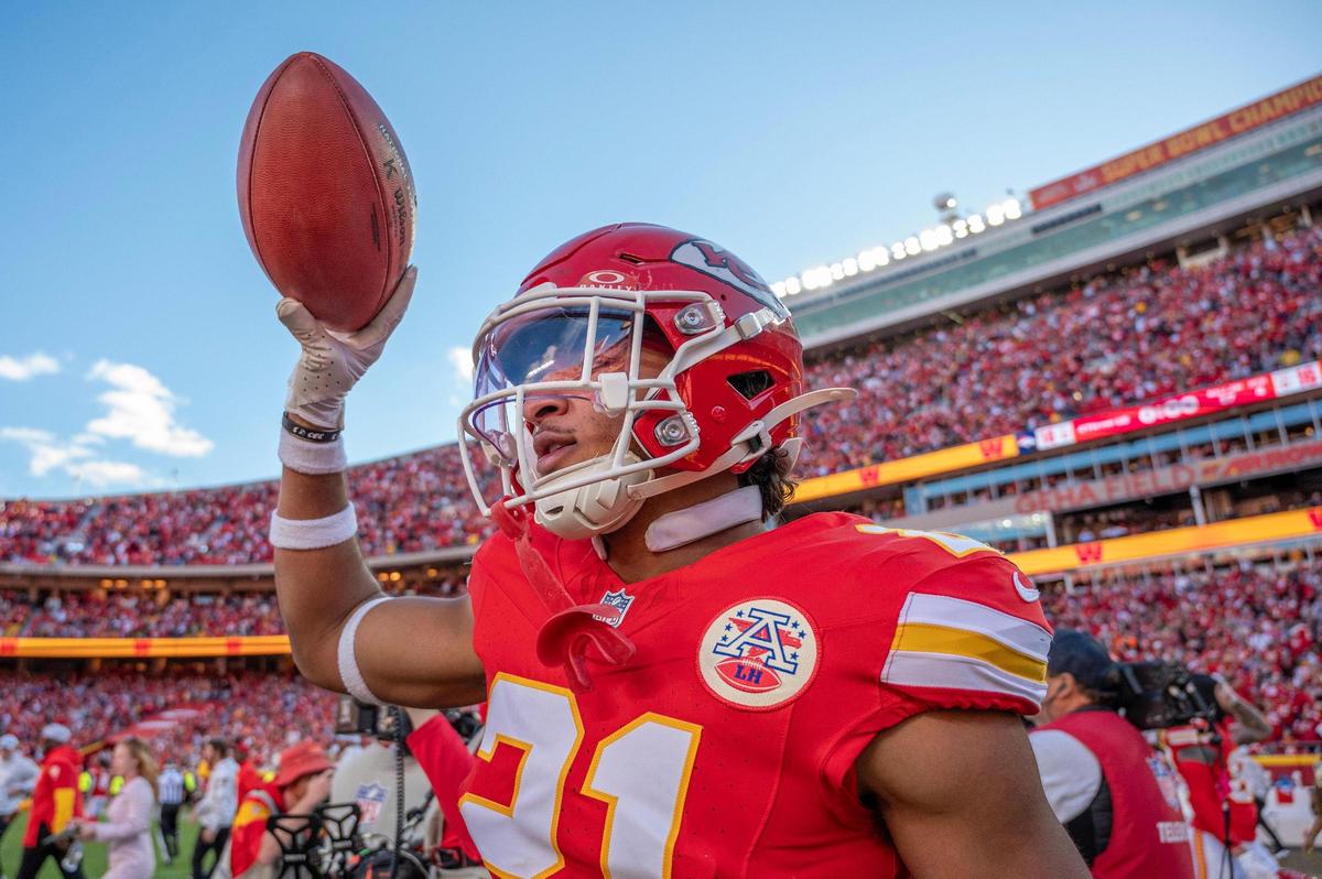 Kansas City Chiefs safety Jaden Hicks (21) holds up the game ball following the Chiefs’ 16-14 victory over the Denver Broncos during an NFL game on Sunday, Nov. 10, 2024, at GEHA Field at Arrowhead Stadium.