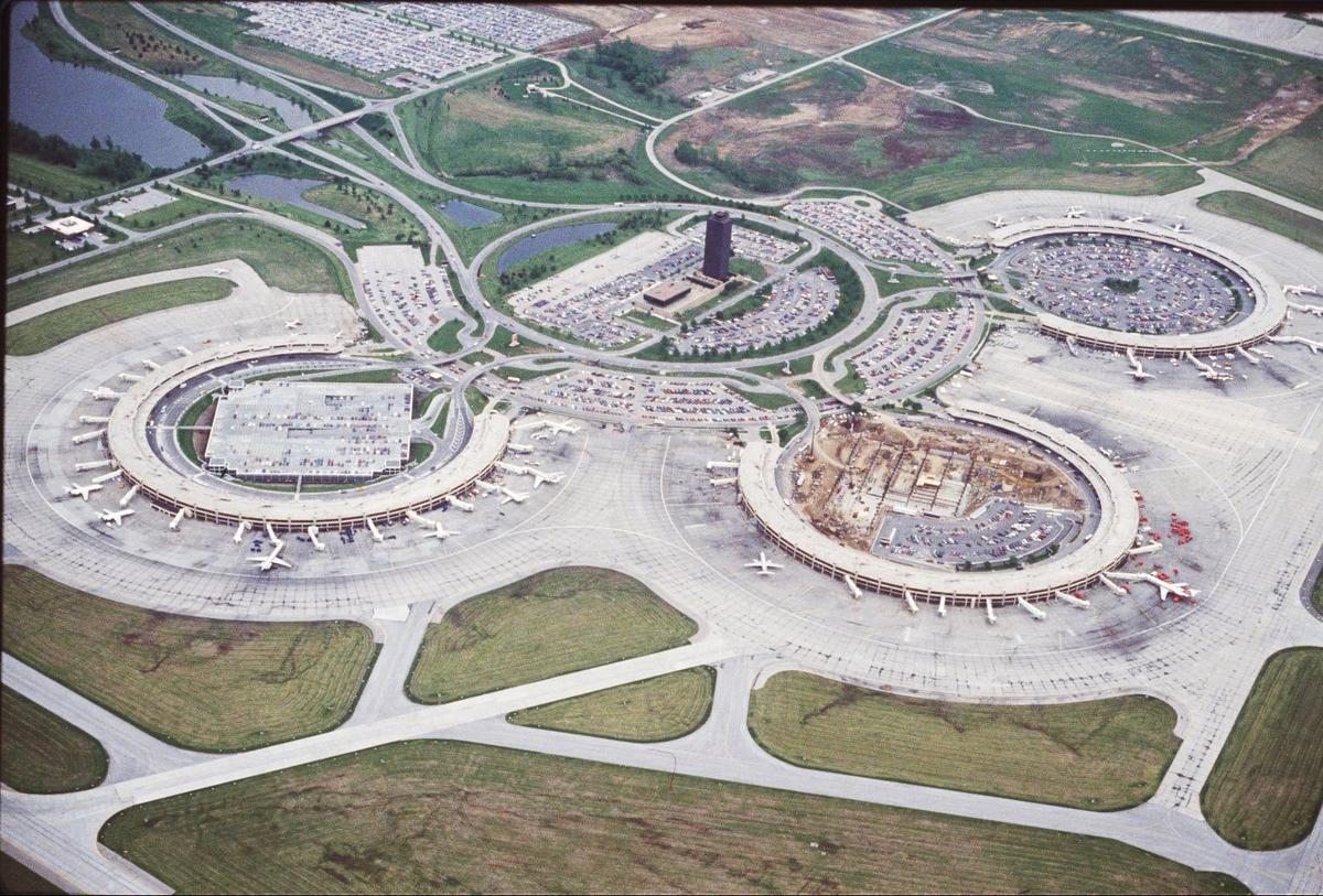 All three of the terminals at Kansas City International Airport ended up with parking garages to replace the single level parking lots at their centers.