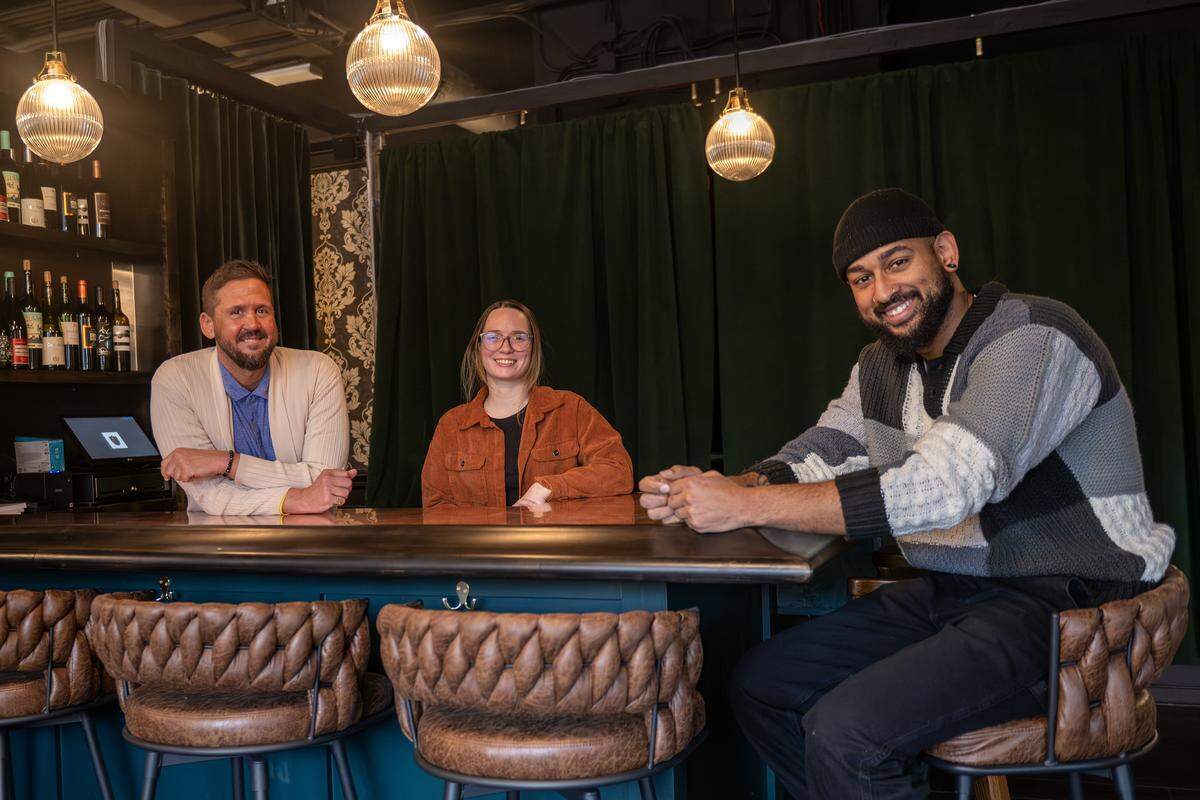 Jeffery Gabrielson, left, Megan Allen and Carlos Ávalos, owners of The Blacklist, pose for a portrait on Tuesday, Jan. 20, 2026, in Leawood.