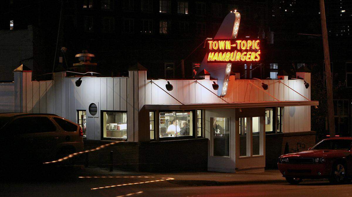 Two men were seriously injured when a person shot them as they sat inside a car early Sunday, June 10, 2018, in a parking lot behind the Town Topic hamburger restaurant at 2021 Broadway in Kansas City's Crossroads Arts District.