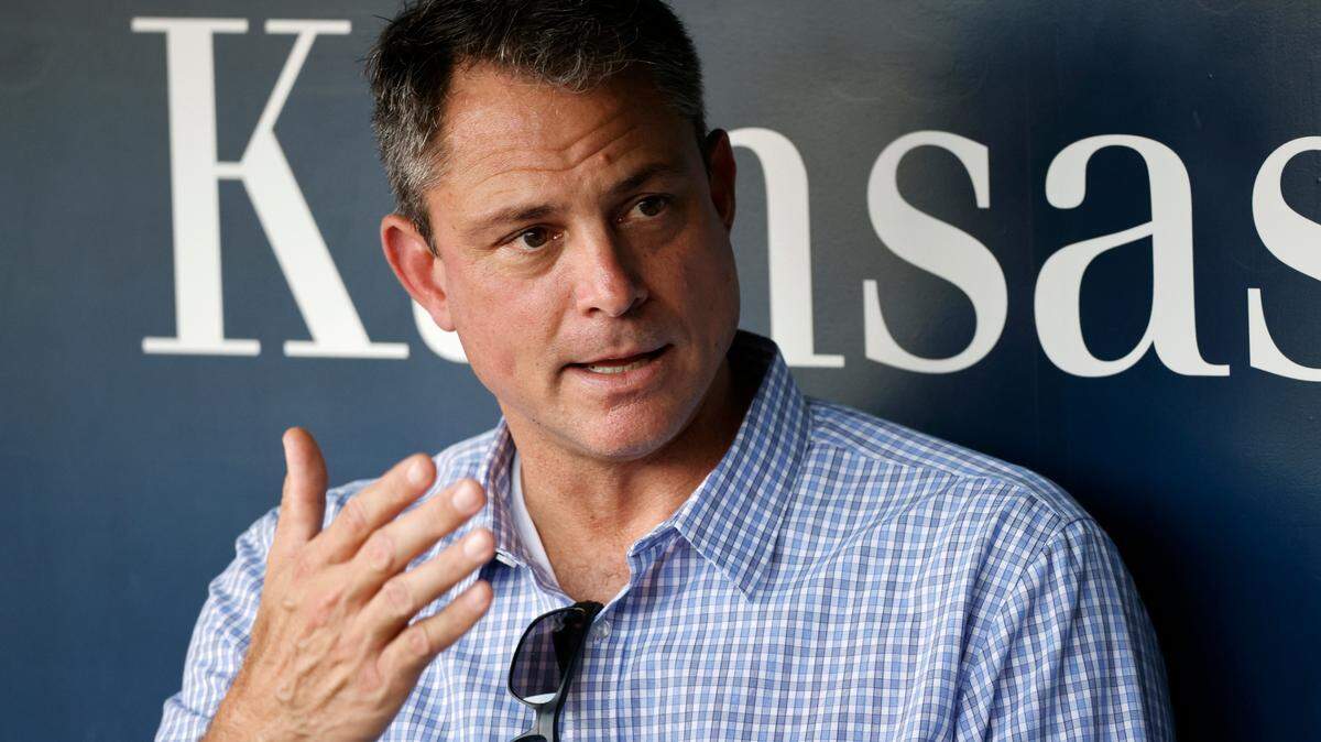 J.J. Picollo, Senior Vice President of Baseball Operations/General Manager for the Kansas City Royals talks with the media in the dugout before a baseball game against the Detroit Tigers in Kansas City, Mo., Friday, Sept. 9, 2022. (AP Photo/Colin E. Braley)