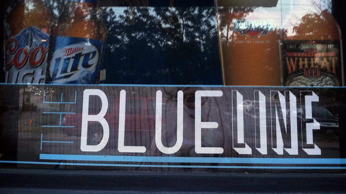 A sign at the Blue Line hockey bar in Kansas City’s River Market.