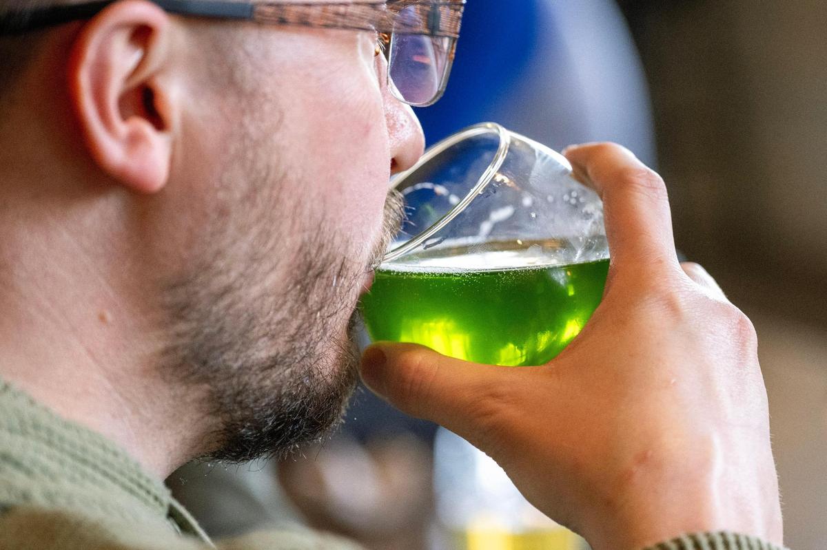 A guest take a sip of Pandan Coconut Doughnut Ale during the release party at Boulevard Brewing Tours and Recreation Center on Sunday, March 9, 2025, in Kansas City.