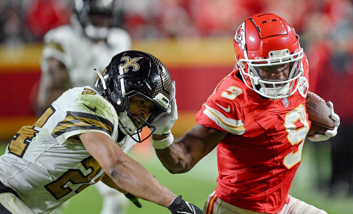 Kansas City Chiefs wide receiver JuJu Smith-Schuster (9) pushes away New Orleans Saints safety Johnathan Abram (24) on a 50-yard reception play in the fourth quarter on Monday, Oct. 7, 2024, at GEHA Field at Arrowhead Stadium.