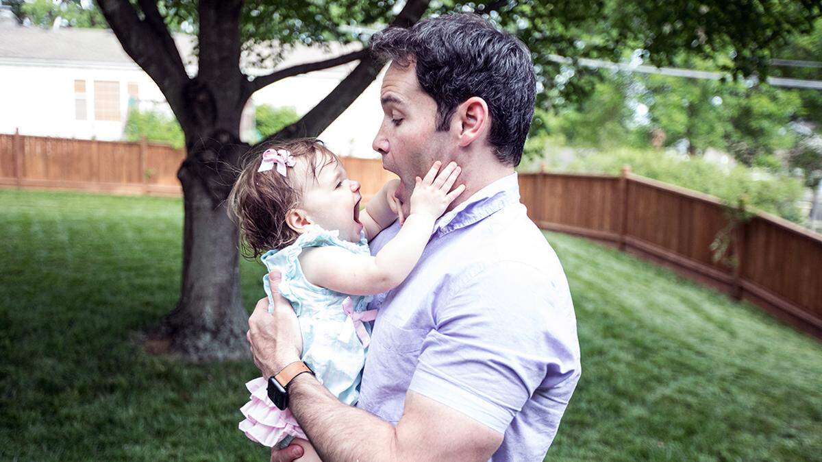 Scott Smith, who was diagnosed with ALS at age 39, with his daughter Iris.