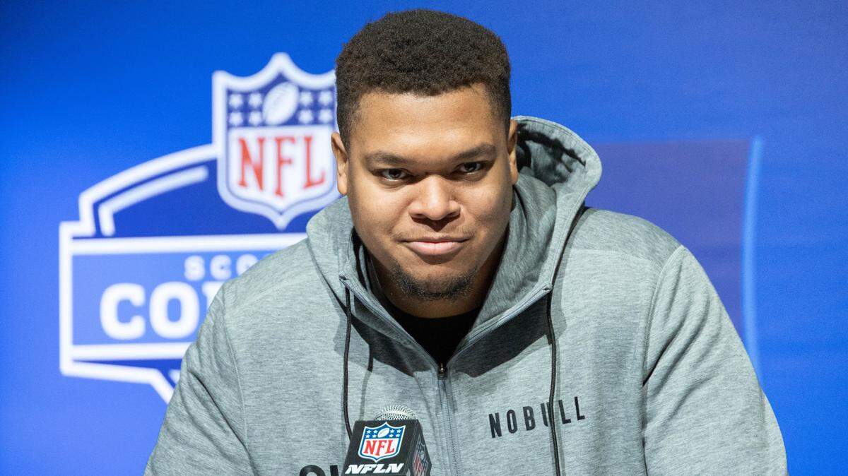 Kansas offensive lineman Earl Bostick, Jr. (OL08) speaks to the press at the NFL Combine at Lucas Oil Stadium in Indianapolis on March 4, 2023.