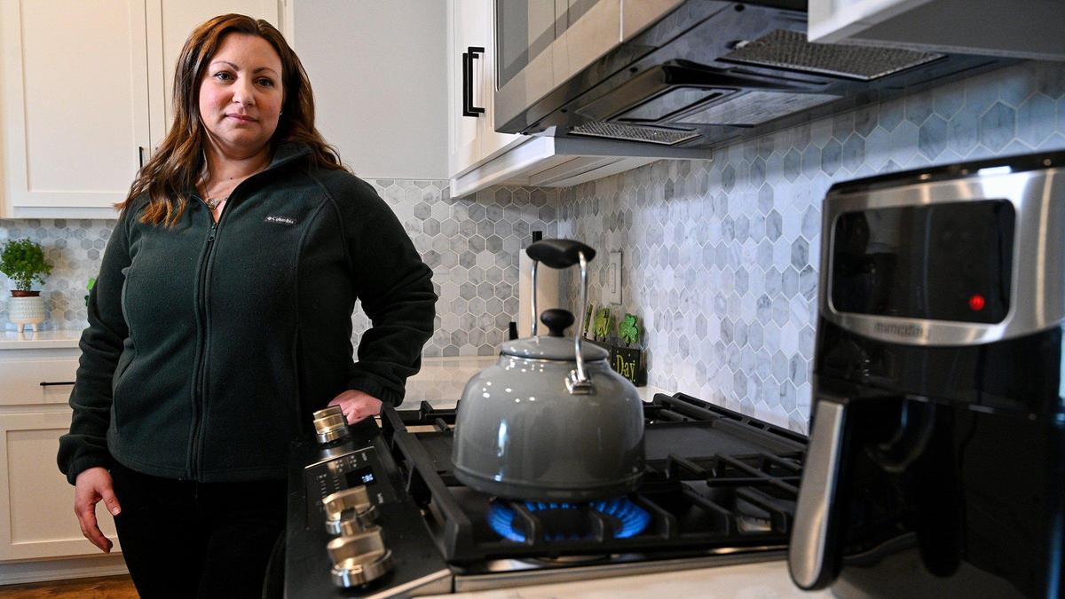 Christina Vaja Hibbs said her family’s gas bill tripled in December, and while they worked to cut back usage, the bill only decreased $30. Vaja Hibbs said although she was excited to have a gas stove in the home her family moved into, to save money she has been choosing to prepare food in their air fryer, right.