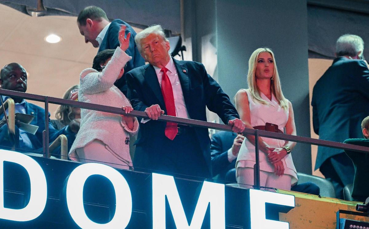 President Donald Trump, center, with his daughter Ivanka, looked over the crowd at Caesars Superdome before the start of Super Bowl LIX on Sunday, Feb. 9, 2025, in New Orleans.