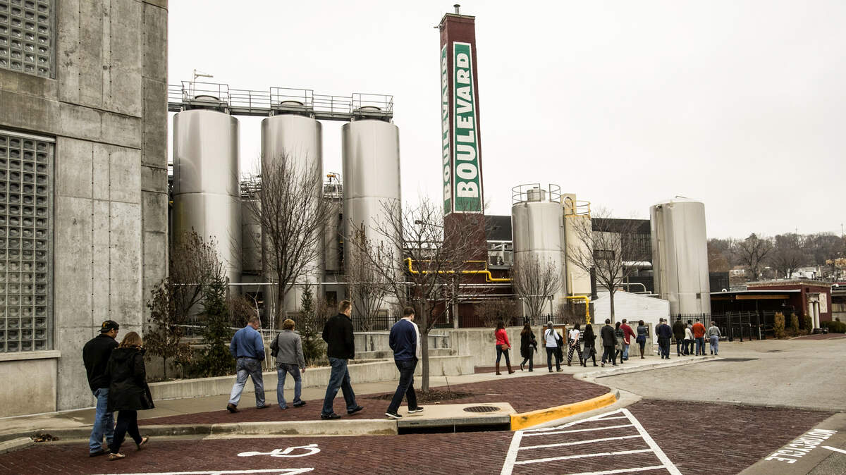 A group of visitors take a tour of Boulevard Brewery Company Monday, January 2, 2017. The brewery opened a new visitor center and beer hall at 2534 Madison Ave. in July. The new visitor center allows the brewery to offer more tours.