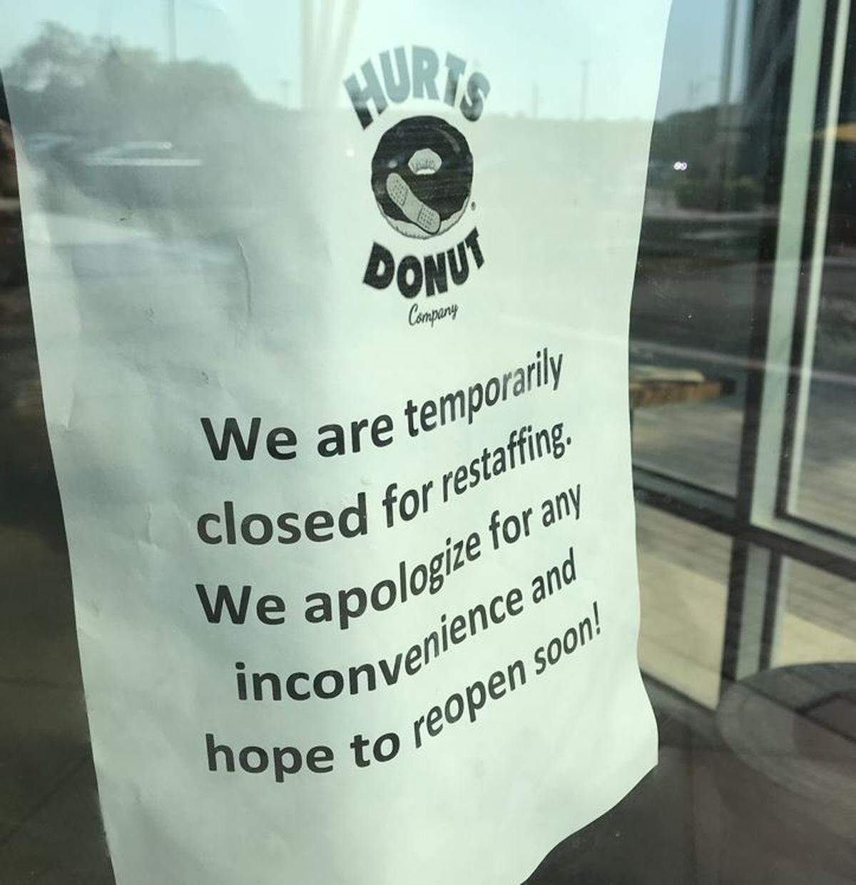 Hurts Donut Co. posted this sign at its Ward Parkway shop in early August.