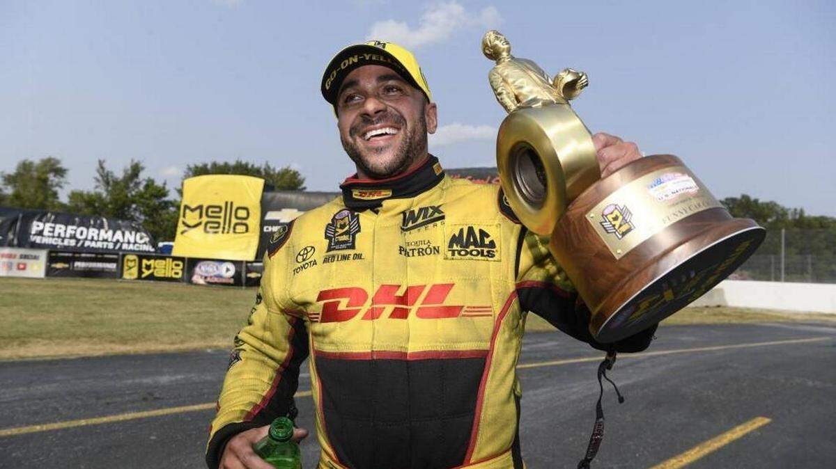 Driver J.R. Todd is the defending Funny Car champion on the NHRA circuit. He brings his familiar yellow DHL ride to Topeka this weekend.