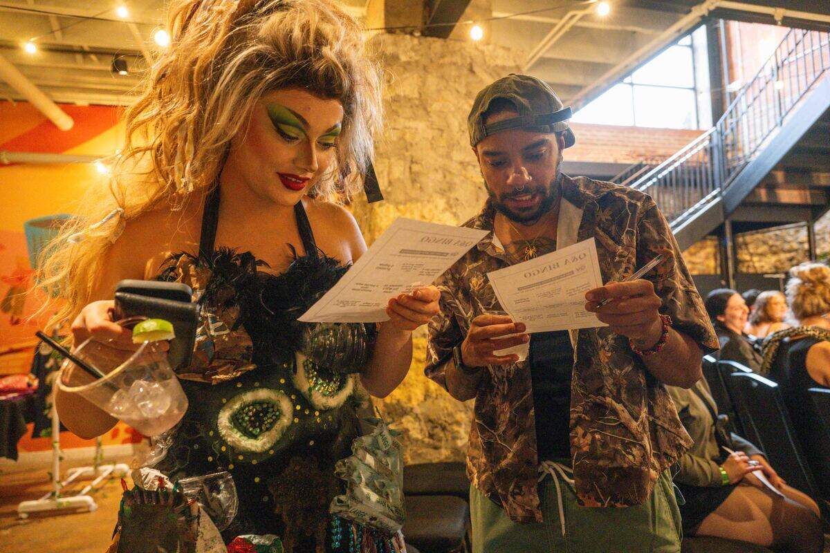 Aly Gory and Dominique Velez go over ice breaker bingo cards together at “Where To Find Us”, an event that invites friends to ‘pitch’ their friends to potential romantic and platonic partners in front of an audience.