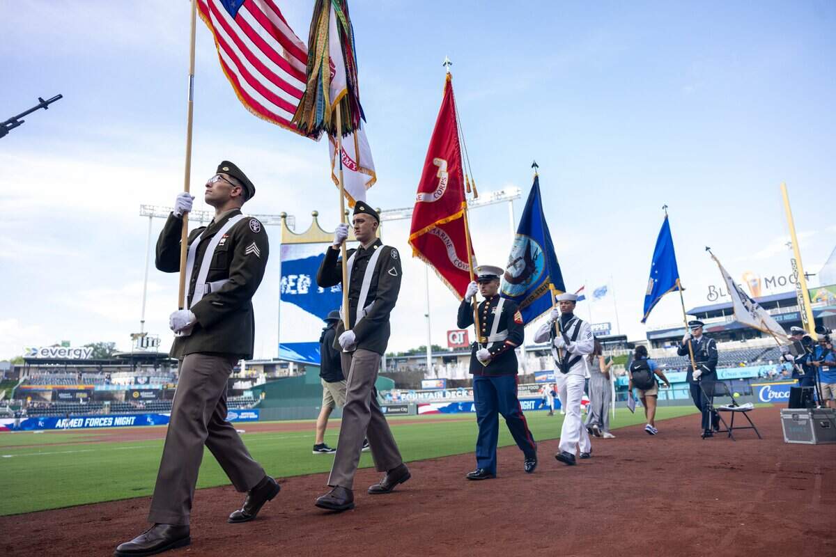 Members from all branches of the military walk onto the field during Thursday's Armed Forces Night game at Kauffman Stadium on July 2, 2026. The Tampa Bay Rays came out on top over the Royals with a final score of 5 to 2.