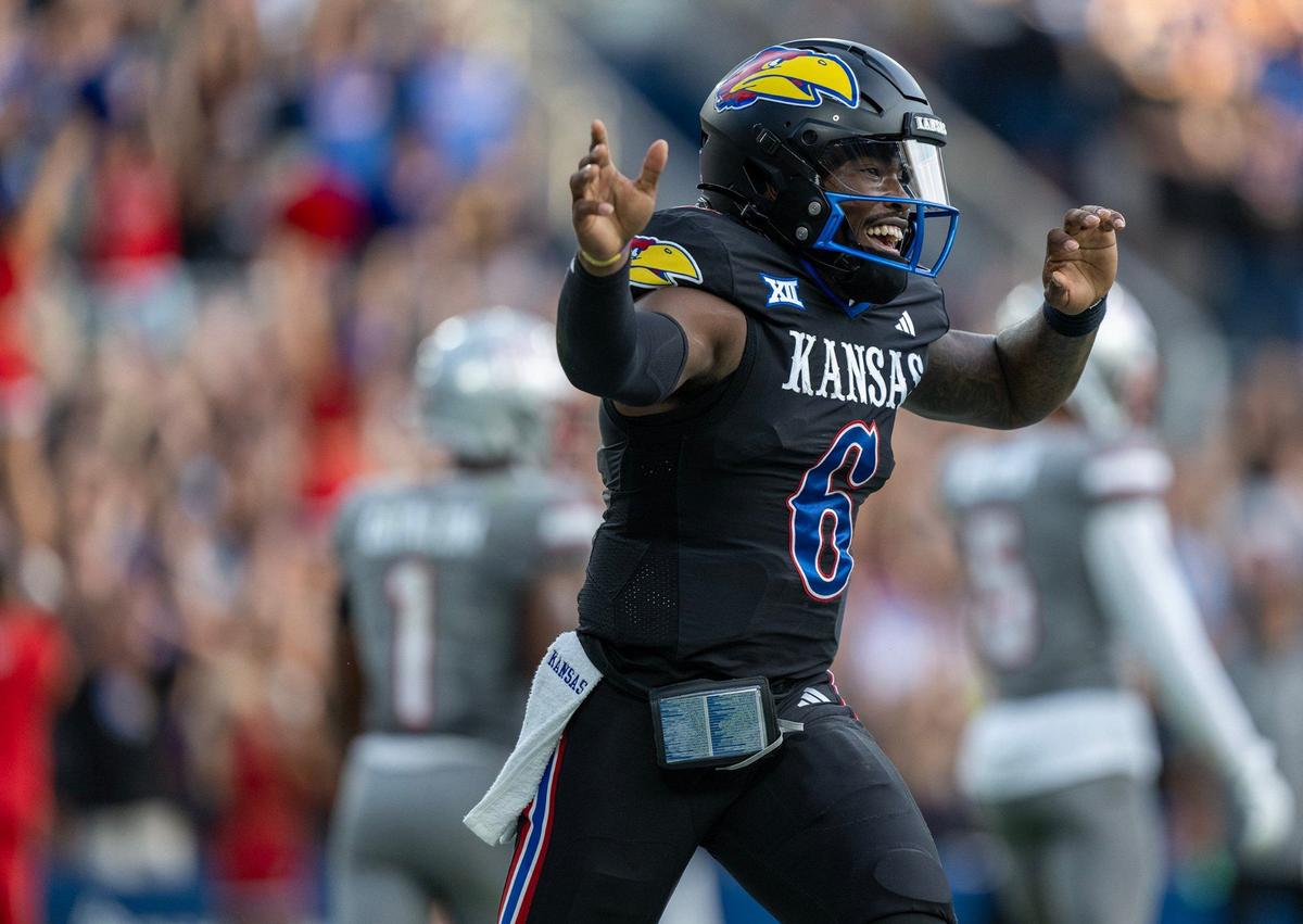 Kansas Jayhawks quarterback Jalon Daniels (6) celebrates his second touchdown against the UNLV Rebels in the first half on Friday, Sept. 13, 2024, at Children’s Mercy Park in Kansas City, Kansas.