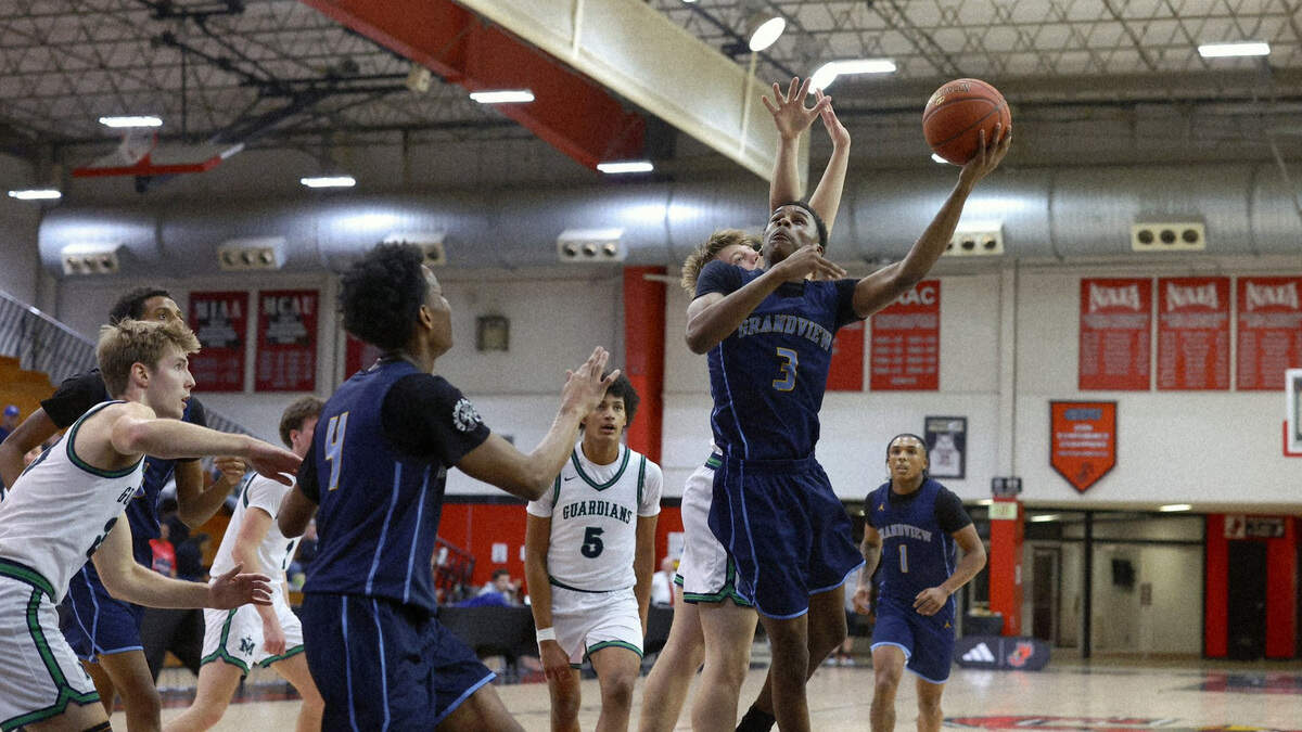 Eli Strother attempts a shot during Grandview’s 52-47 defeat of St. Michael the Archangel in the William Jewell Classic boys high school basketball tournament on Saturday, Dec. 28, 2025 in Liberty, Missouri.