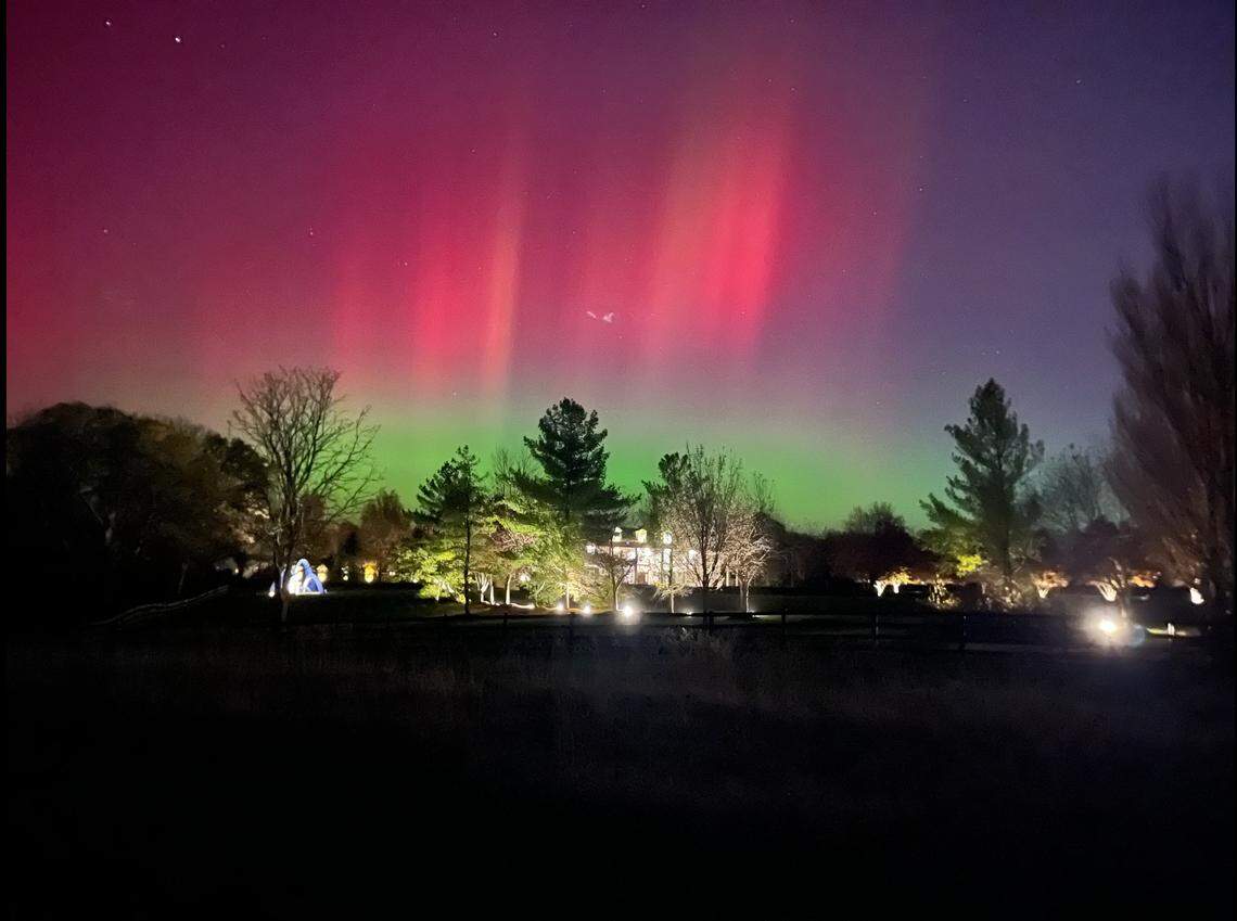 A view of the northern lights above a home in Lawrence.