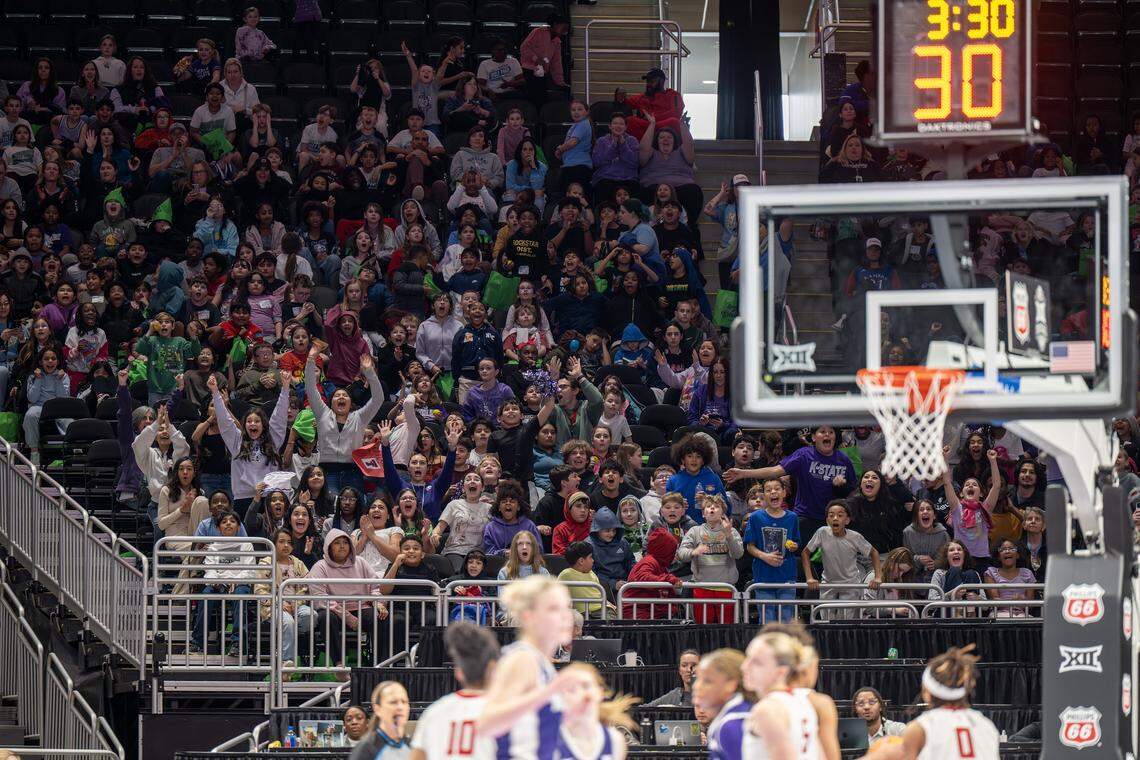 Fans cheer after Kansas State Wildcats forward Nastja Claessens (4) makes a free throw during the fourth quarter of the Big 12 Women's Basketball Tournament at T-Mobile Center on Thursday, March 5, 2026, in Kansas City.