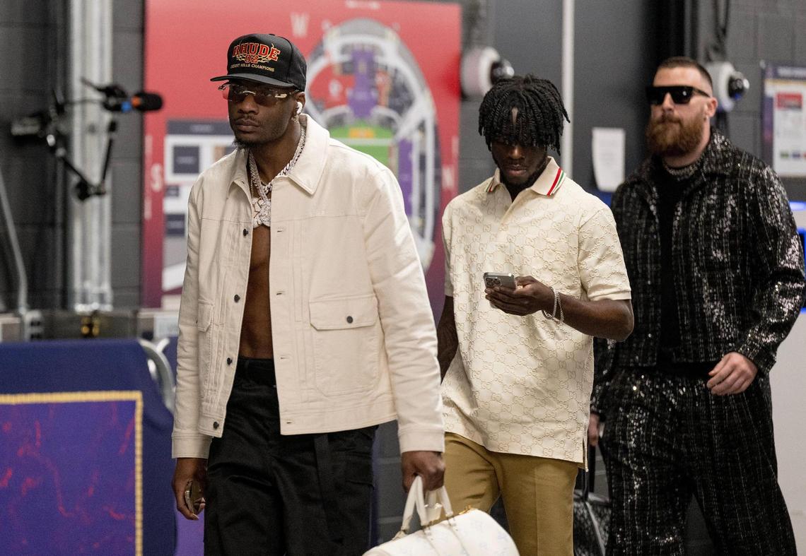Kansas City Chiefs wide receiver Marquez Valdes-Scantling, left, walks to the locker room after arriving at Allegiant Stadium for Super Bowl LVIII on Sunday, Feb. 11, 2024, in Las Vegas.