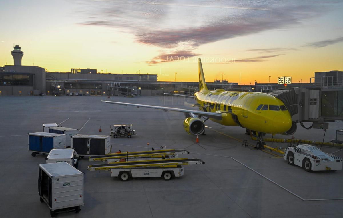 A Spirit Airlines jet sits at a gate at the new $1.5 billion single terminal at Kansas City International Airport, which opened to travelers Tuesday, Feb. 28, 2023.
