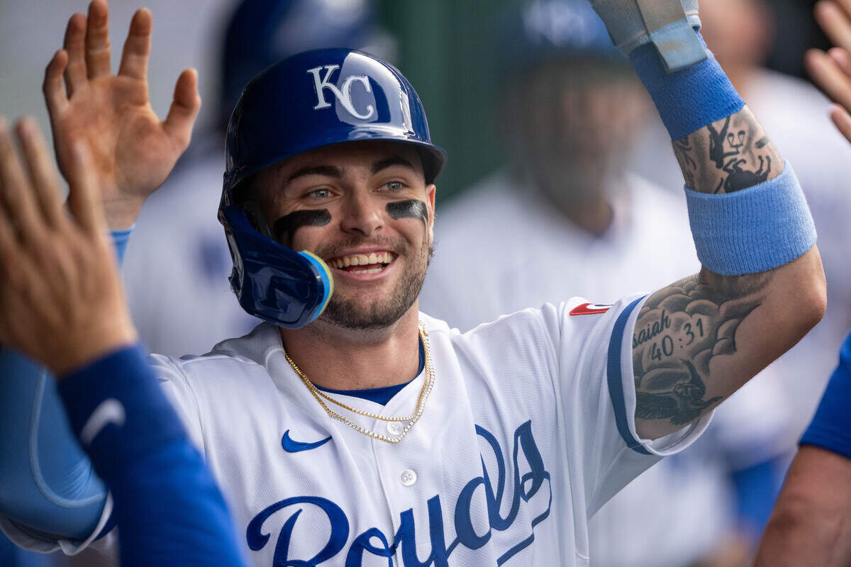 Royals catcher Carter Jensen celebrates in the dugout after scoring a run during KC’s 14-6 win against the St. Louis Cardinals at Kauffman Stadium in Kansas City on Thursday, June 18, 2026.
