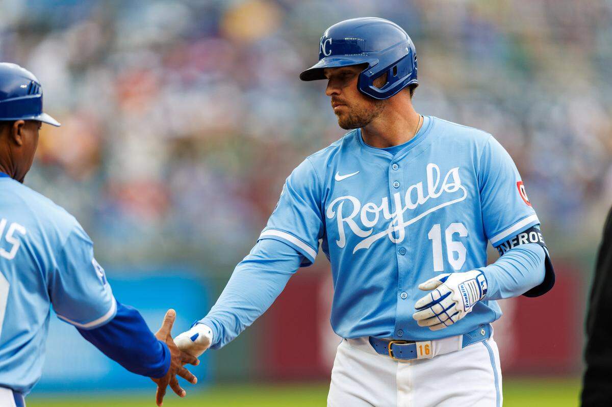 Kansas City Royals outfielder Hunter Renfroe (16) on first base during the eighth inning against the Houston Astros at Kauffman Stadium on April 27, 2025.