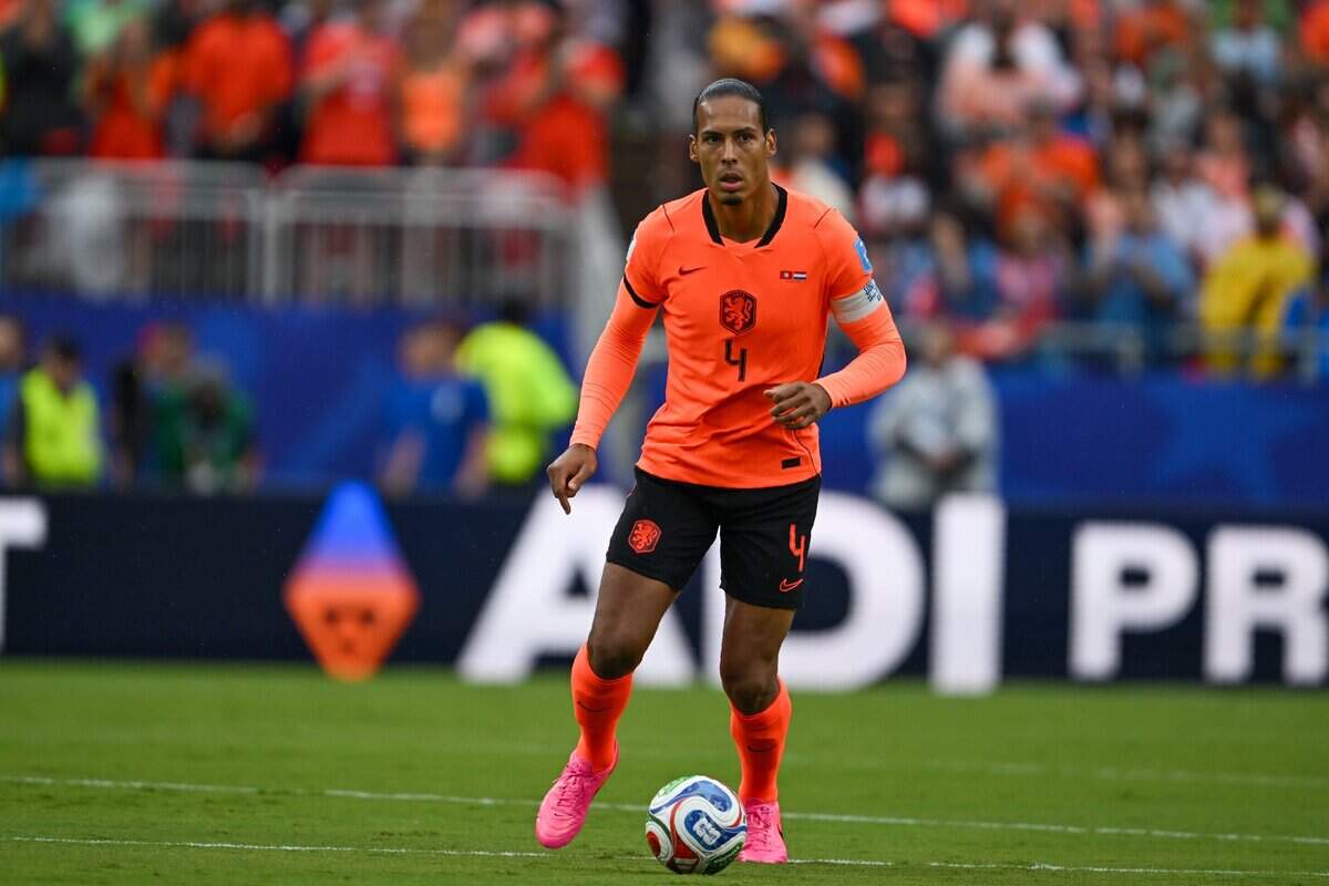 Netherlands defender Virgil van Dijk (4) moves the ball down the pitch in the Netherlands vs. Tunisia FIFA World Cup group-stage soccer match at Kansas City (Arrowhead) Stadium in Kansas City on Thursday, June 25, 2026.