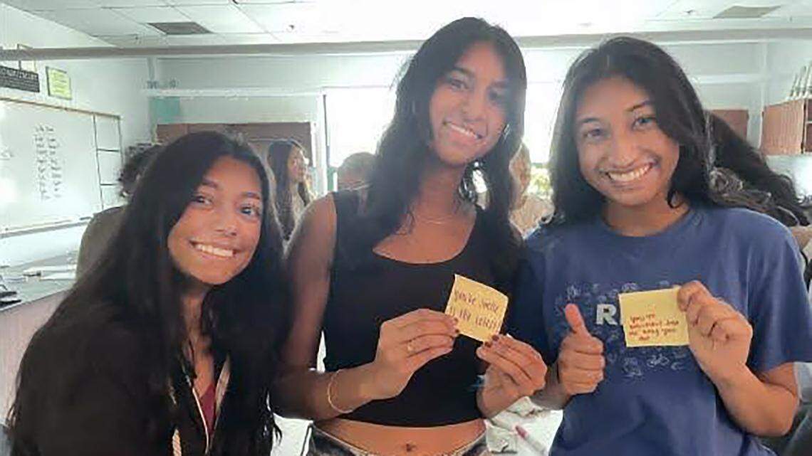 Students at Blue Valley West participated in an activity where they wrote an insecurity on a sticky note. They then passed the note to the person next to them, and that person instead wrote a compliment on the back.