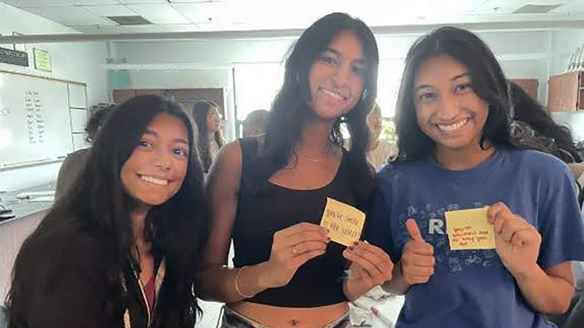 Students at Blue Valley West participated in an activity where they wrote an insecurity on a sticky note. They then passed the note to the person next to them, and that person instead wrote a compliment on the back.