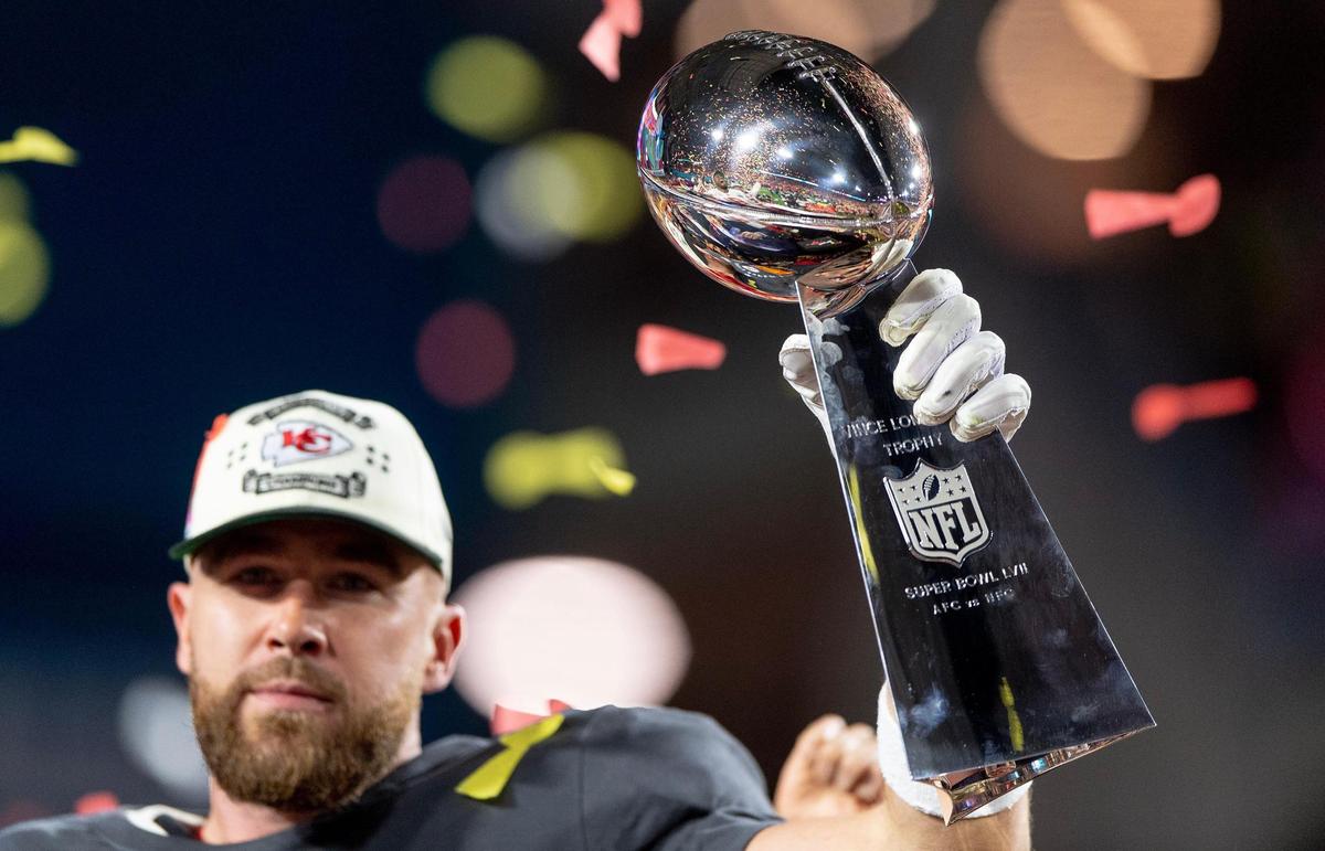 Kansas City Chiefs tight end Travis Kelce hoisted the Vince Lombardi Trophy after the Chiefs beat the Philadelphia Eagles in the Super Bowl. They will try for a second consecutive win on Feb. 11.