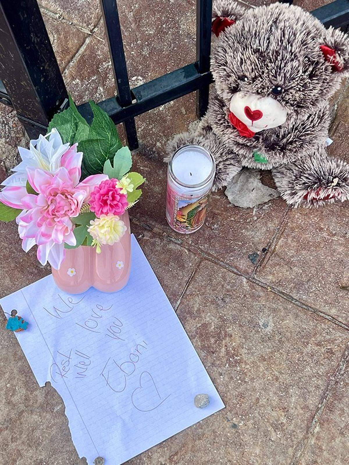 One day after a shooting left two women dead, a memorial sits outside a Kansas City nightclub at 2801 Southwest Blvd., on Monday, Feb. 16, 2026, in Kansas City. A message reads, “We love you Eboni, rest well.”