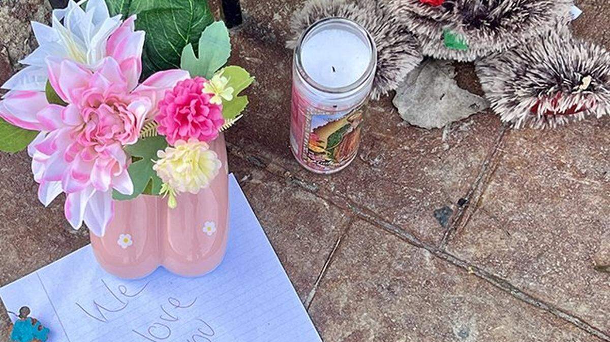 One day after a shooting left two women dead, a memorial sits outside a Kansas City nightclub at 2801 Southwest Blvd., on Monday, Feb. 16, 2026, in Kansas City. A message reads, “We love you Eboni, rest well.”