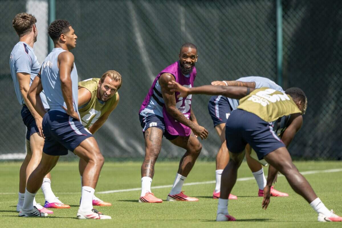 Members of the England national soccer team stretch during practice at Swope Soccer Village on Tuesday, July 14, 2026, in Kansas City.