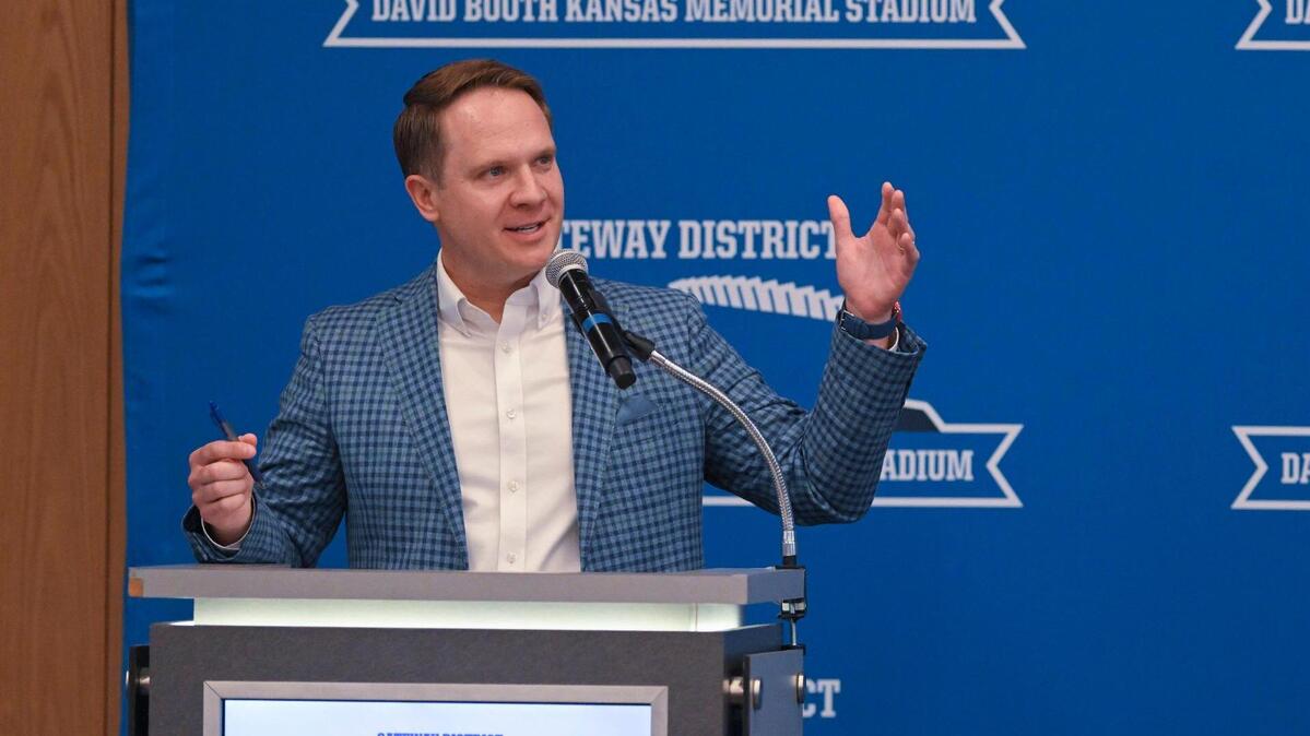 Travis Goff, KU athletic director, addressed the crowd as the University of Kansas and Kansas Athletics revealed plans Wednesday, Aug. 15, 2023, for renovations to David Booth Kansas Memorial Stadium and a campus Gateway Project in Lawrence.
