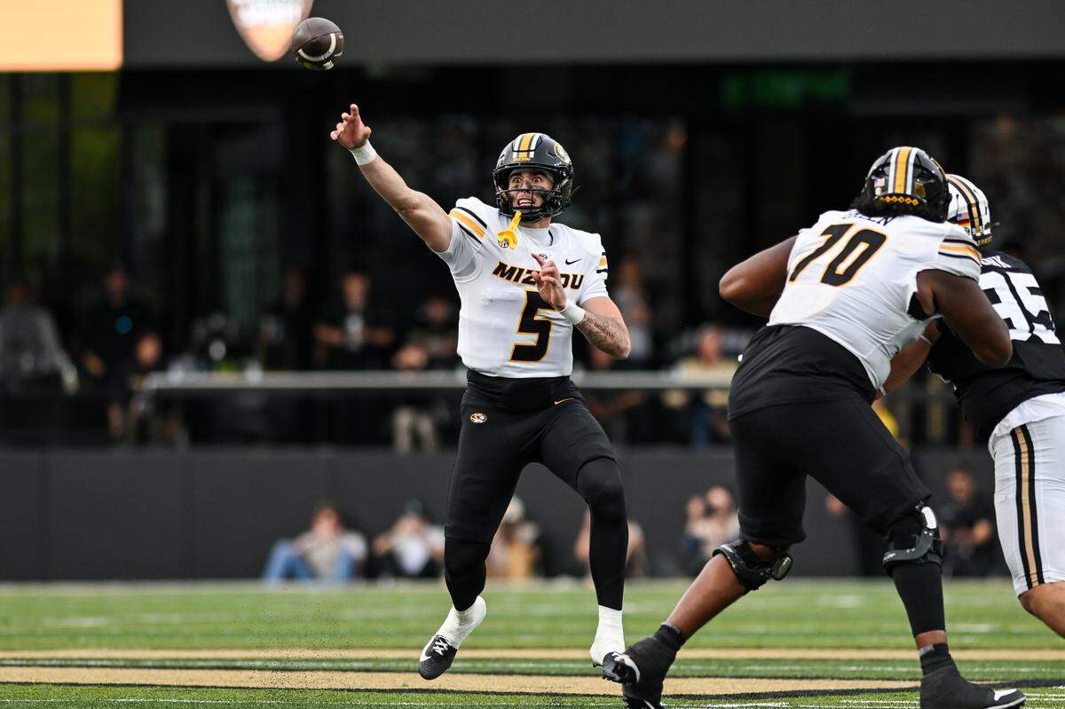 Matt Zollers #5 of the Missouri Tigers throws the ball against the Vanderbilt Commodores in the second half at FirstBank Stadium on October 25, 2025 in Nashville,