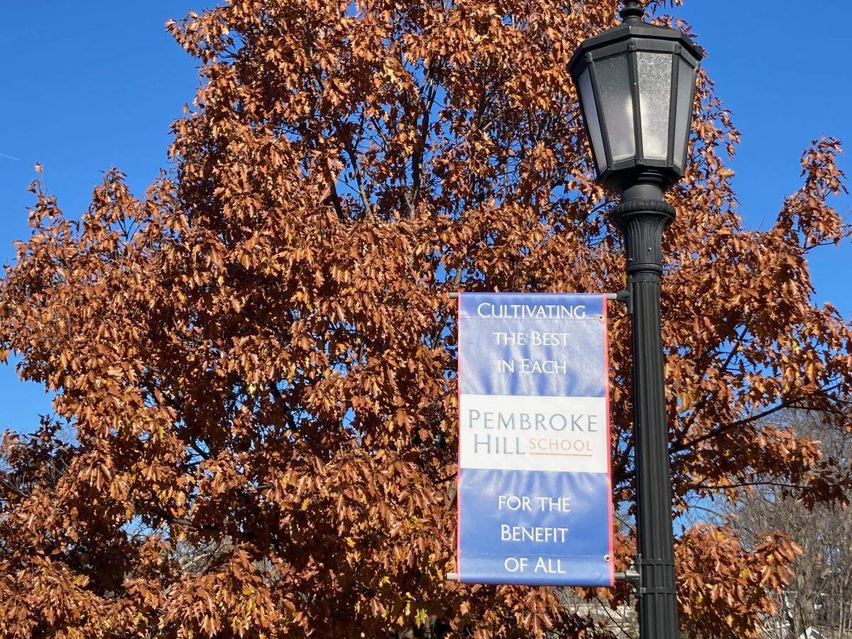 A banner on the campus of the private Pembroke Hill School reads, “Cultivating the best in each for the benefit of all.”