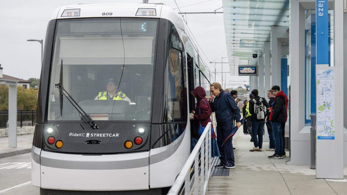 KC Streetcar driver Cassandra Mohling waits at the new Plaza stop as passengers board the streetcar during the grand opening of Main Street Extension on Friday, October 24, 20225, in Kansas City.