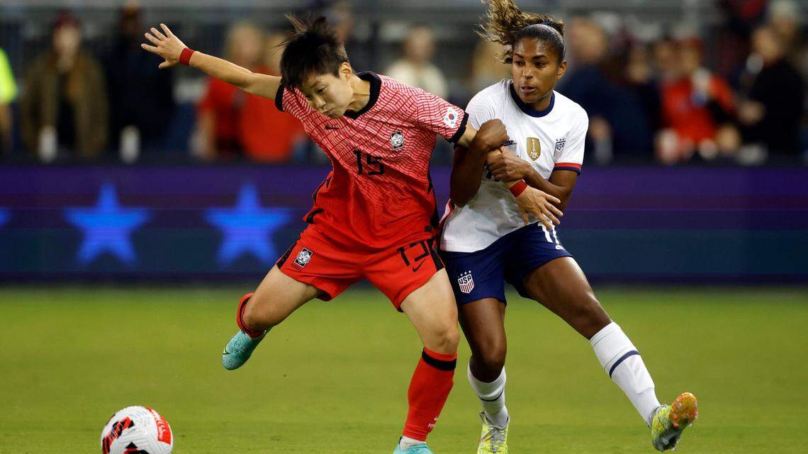 U.S. midfielder Catarina Macario, right, battles South Korea midfielder Park Yeeun for the ball during Thursday night’s match at Children’s Mercy Park in Kansas City, Kan.